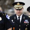 Army Lieutenant Colonel Alexander Vindman, a military officer at the National Security Council, center, arrives on Capitol Hill in Washington, Tuesday, Oct. 29, 2019.
