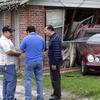 A Mercedes-Benz sedan was knocked into a home by a suspected drunk driver, not shown, in the Oak Cliff section of Dallas, Texas on Wednesday, March 7, 2012. (AP Photo/LM Otero)