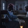 This image released by Focus Features shows Cynthia Erivo as Harriet Tubman, left, and Vondie Curtis-Hall as Reverend Green in a scene from 'Harriet.'
