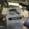 In this Feb. 23, 2016 file photo, gun safety and suicide prevention brochures are on display next to guns for sale at a local retail gun store in Montrose Colo. 