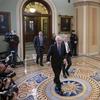 Senate Majority Leader Mitch McConnell, R-Ky., leaves the chamber during a short break in the impeachment trial of President Donald Trump on charges of abuse of power and obstruction of Congress.