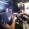 In this April 13, 2016 file photo Los Angeles Lakers' Kobe Bryant, right, fist-bumps his daughter Gianna after the last NBA basketball game of his career.