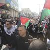 Palestinians protest Middle East peace plan announced Tuesday by US President Donald Trump, which strongly favors Israel, in Bethlehem, West Bank, Wednesday, Jan 29, 2020.