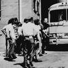 One unidentified white man sits in front of Greyhound bus to prevent it from leaving the station with load of Freedom Riders testing bus station segregation in South, Sunday, May 15, 1961.