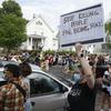 Hundreds of protesters gather Tuesday, May 26, 2020, near the site of the arrest of George Floyd, who died in police custody Monday night in Minneapolis.