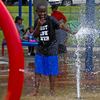 Jacob Smith, 14, of Pittsburgh plays in the spray park in the Squirrel Hill neighborhood of Pittsburgh on, Monday, June 15, 2020. 