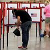Voters fill out their ballots during in person voting in the Kentucky Primary at the Kentucky Exposition Center in Louisville, Ky., Tuesday, June 23, 2020. 