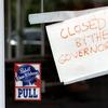 A sign on the door of the West Alabama Icehouse reads 'Closed by the Governor', Monday, June 29, 2020, in Houston.