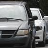 Cars line up at a community coronavirus testing site operated by Cone Health and the county Health Department in Burlington, N.C., Thursday, July 9, 2020.