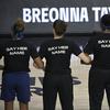 Minnesota Lynx players lock arms during a moment of silence in honor of Breonna Taylor before a WNBA basketball game against the Connecticut Sun, Sunday, July 26, 2020, in Bradenton, Fla.