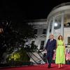 President Donald Trump and first lady Melania Trump arrive for his acceptance speech to the Republican National Committee Convention on the South Lawn of the White House, Thursday, Aug. 27, 2020.