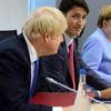 (L-R) British Prime Minister Boris Johnson, Canadian Prime Minister Justin Trudeau, German Chancellor Angela Merkel and French President Emmanuel Macron at last year's G7.