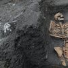 human skeleton remains excavated in the earth