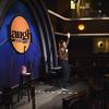 Comedian Daphnique Springs performs to an empty room during a 'Laughter is Healing' stand-up comedy livestream event at the Laugh Factory comedy club, Monday, April 20, 2020, in Los Angeles. 