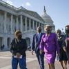Members of the Congressional Black Caucus walk to make a make a statement on the verdict in the murder trial of former Minneapolis police Officer Derek Chauvin in the death of George Floyd.