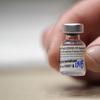 This Jan. 24, 2021, file photo shows a vial of the Pfizer vaccine for COVID-19 in Seattle. U.S. regulators on Monday, May 10, 2021, expanded use of Pfizer's shot to those as young as 12.