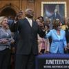 House Majority Whip James Clyburn, D-S.C., left, celebrates with Speaker of the House Nancy Pelosi and members of the Congressional Black Caucus after passage of the Juneteenth National Independence 