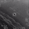a black and white image from a video of black dot on a radar screen