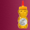 plastic bear-shaped honey jar holding a moon against a wine-colored, paper-textured background