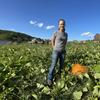 Amanda Dykeman in a pumpkin field at Dykeman Farm