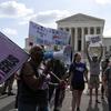 Abortion rights activists protest outside the Supreme Court in Washington, Friday, June 24, 2022. The Supreme Court has ended constitutional protections for abortion that had been in place nearly 50 y