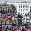 With the White House in the background, President Donald Trump speaks at a rally in Washington, Jan. 6, 2021. 