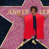 Portrait of Jenifer Lewis in front of her Hollywood star.