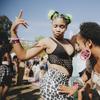 Two women dancing at a concert