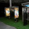 Three repurposed phone booths