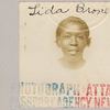 A discolored old passport photograph from the 1930s
