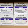 The flat sides of six boxes of mifepristone are stacker two by three, with 'Mifepristone 200mg' in big letters