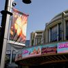 Advertisements for the films 'Oppenheimer' and 'Barbie' appear at AMC Theaters at The Grove on Thursday, July 20, 2023, in Los Angeles.