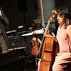 A woman plays the cello