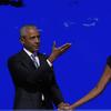 Former President Barack Obama hugs former first lady Michelle Obama as he is introduced during the Democratic National Convention Tuesday, Aug. 20, 2024, in Chicago.
