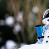 Snowman with headphones and an app.