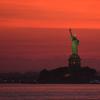 A view of the Statue of Liberty seen from New Jersey, United States as a dangerous heat wave sweeps across the region on June 23, 2025.