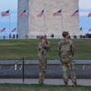 National Guard troops walk along the National Mall on August 12, 2025 in Washington, DC.