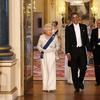 Queen Elizabeth II (L) arrives with U.S. President Barack Obama, his wife Michelle Obama and Prince Philip, Duke of Edinburgh (R) in the Music Room of Buckingham Palace ahead of a State Banquet on May