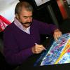Artist LeRoy Nieman signs autographs at the 100 Days to Vancouver Celebration on November 4, 2009 at the Rockefeller Center in New York City. 