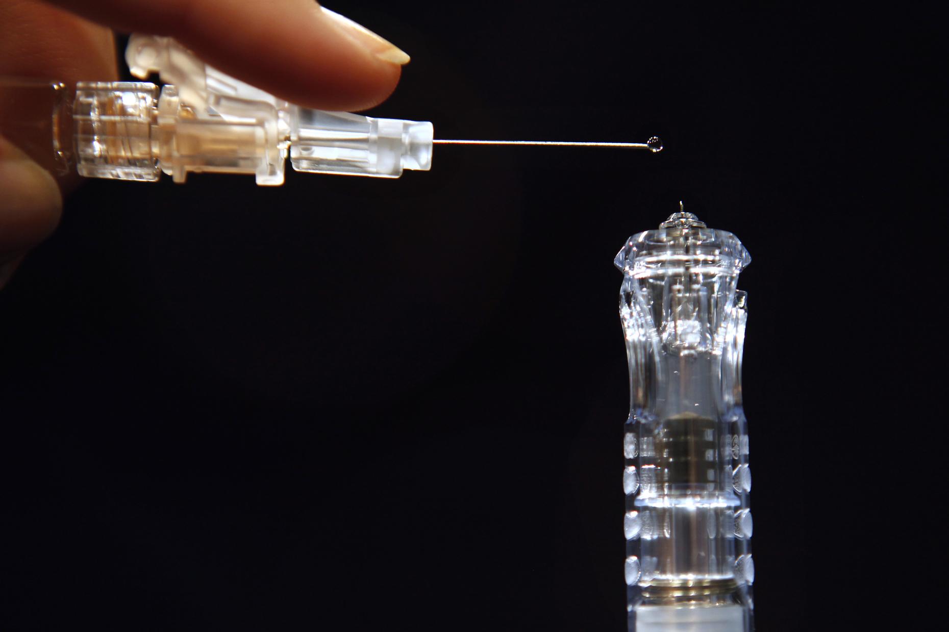 QAnon Leader Tells Followers 'Shoot to Kill' Vaccine Doctors