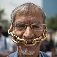 A Mexican journalist takes part in a demonstration against violence towards journalists in Mexico, on August 7, 2010 in Mexico City. 