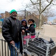 Eddie Span, his son and niece a few days after Sandy. Span said NYCHA hadn't done anything to help residents of the Hammel Houses.