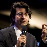 eBay founder Pierre Omidyar speaks during the panel session during the annual Clinton Global Initiative (CGI) on September 23, 2010 in New York City.