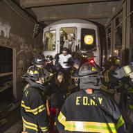 Emergency service workers responded to the derailment of an F train under Broadway and 60th Street in Woodside, Queens, on May 2, 2014. 