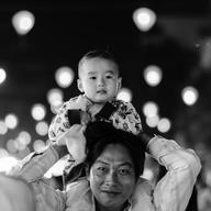 Father and son. Cantho city, Vietnam. January 27, 2014