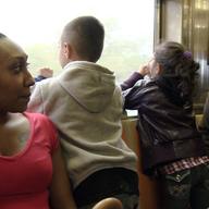 Hannah, Philly, and Hannah’s two children ride the subway together during one of their weekend visits.