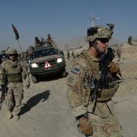 US soldiers arrive at the site of a suicide attack in Maidan Shar, the capital city of Wardak province south of Kabul on September 8, 2013.