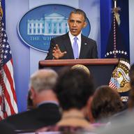 U.S. President Barack Obama pauses as he speaks on the Affordable Care Act in the Brady Press Briefing Room of the White House on November 14, 2013 in Washington, D.C. 