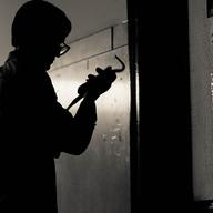 Keith Forsyth (played by Daniel S. Taylor) prepares to break-in to the Media, Pa. FBI office.