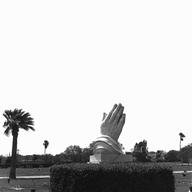 Monument of praying hands in a cemetery in Corpus Christi, Texas, 1997